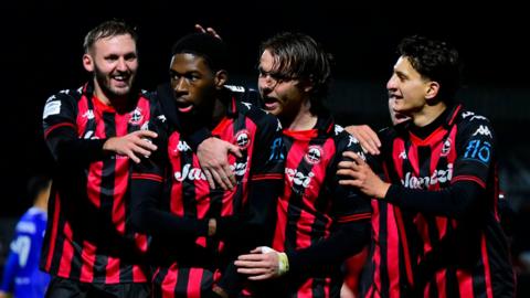 Truro City players celebrate Dominic Johnson-Fisher's goal against Wealdstone