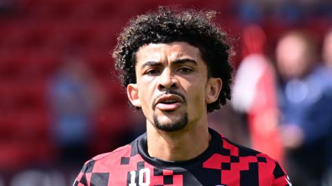 Josh Gordon warming up ahead of a Walsall match this season