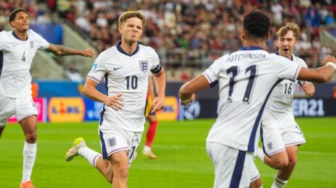 James McAtee celebrates scoring for England Under-21s