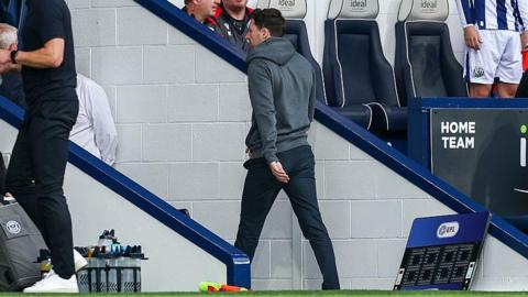 Ryan Mason walks off after being shown a red card