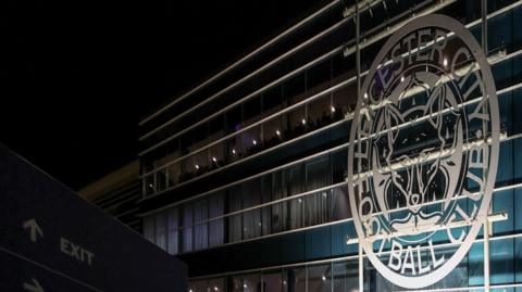 General view of a Leicester City sign from the front of King Power Stadium