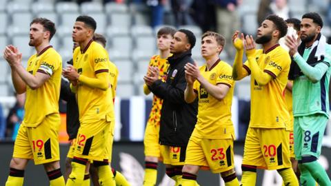 Sheffield United players applaud