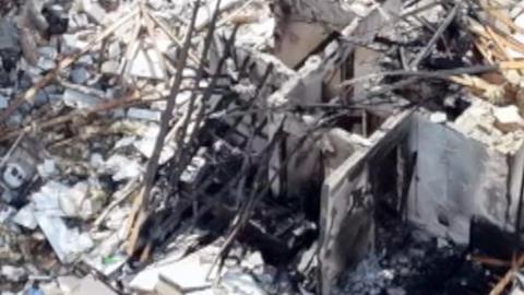 Ruins of bungalow explosion.