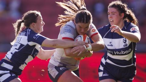 Leanne Infante of Saracens carries the ball during the match against Bristol Bears