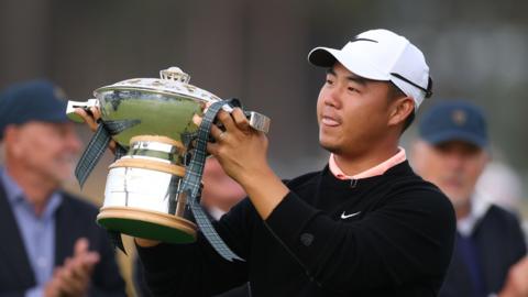 Tom Kim with trophy