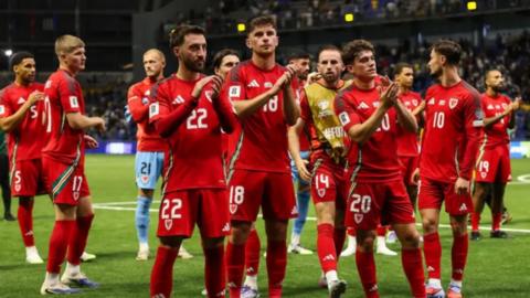 Wales players applaud fans in Kazakhstan