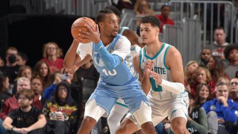 Darius Garland (left) with the ball during the Cleveland Cavaliers' win over the Charlotte Hornets