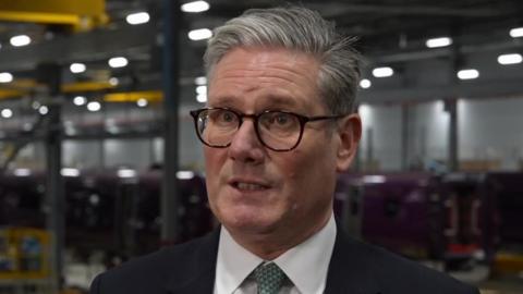 Sir Keir Starmer in a factory