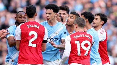 Man City and Arsenal players