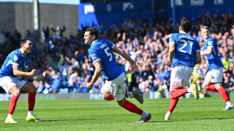 Portsmouth celebrate scoring against Oxford