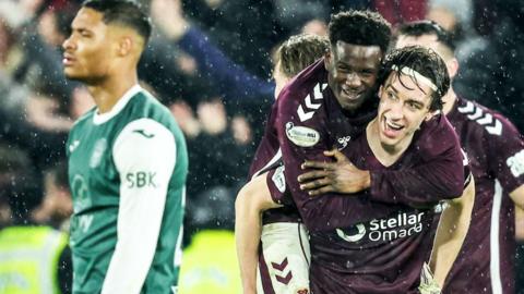 Hearts scorer Tomas Magnusson (right) celebrates