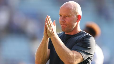 Sheffield Wednesday manager Henrik Pedersen claps away fans after Leicester City defeat
