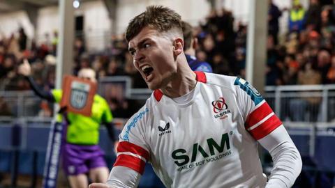 Jake Flannery celebrates
