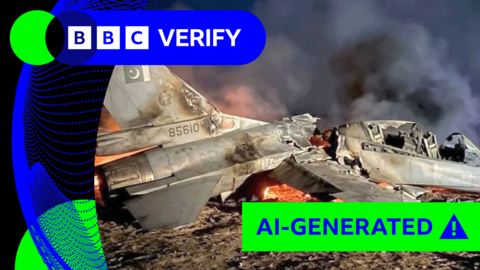 Image of crashed F-16 jet surrounded by flames and smoke with AI-generated green tag on the image 