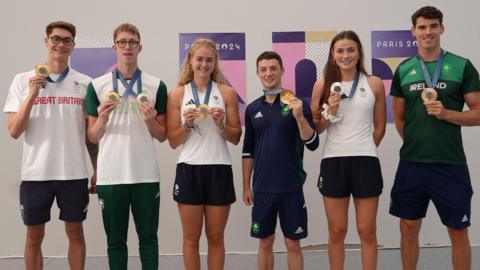 SIx medallists from Northern Ireland (l to r) Jack McMillan, Daniel Wiffen, Hannah Scott, Rhys McClenaghan, Rebecca Shorten and Philip Doyle