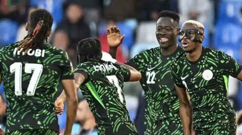 Nigeria celebrate a goal
