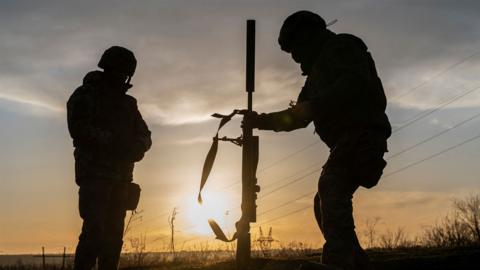 Ukrainian Army snipers stand at shooting range near front line in Donetsk region
