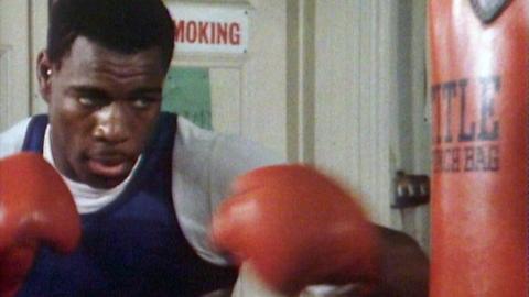 Frank Bruno boxing a punch bag