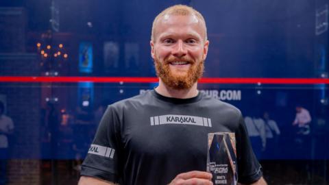Joel Makin with trophy