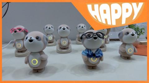 Meerkat robots and the Happy logo.