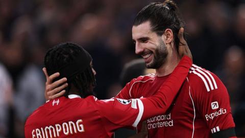 Dominik Szoboszlai and Jeremie Frimpong celebrate during Liverpool's win at Marseille