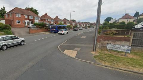 Stourbridge Road is going from the bottom left of the photo to the middle, where it is higher up on the image. Pictured is the junction with Foxhollies Drive, which is on the bottom right of the photo.