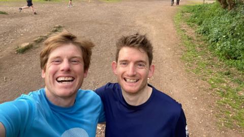 Ian Williams and his brother Evan on a running track in Caffarella Park