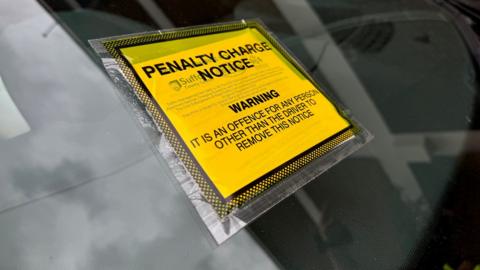 Parking ticket on a car