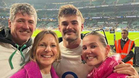 England fullback George Furbank with his family at Twickenham