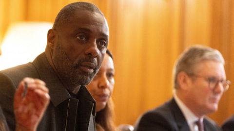 Hollywood star Idris Elba (left) speaks at the 10 Downing Street knife crime summit with prime minister Keir Starmer (right)