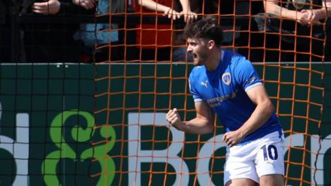 Lee Bonis of Chesterfield celebrates