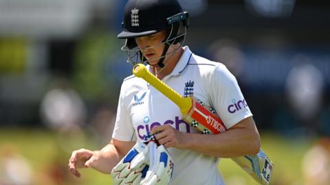 England batter Harry Brook looks dejected as he walks off after being dismissed