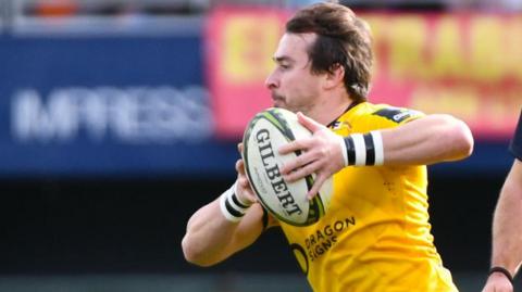 Rhodri Williams attacks for Dragons