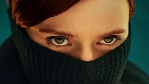 Say nothing promo image - red head girl with face partially covered in balaclava