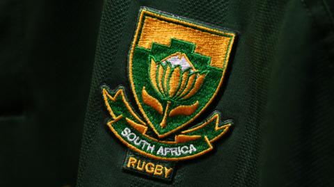A close up of a South Africa Rugby crest on a shirt