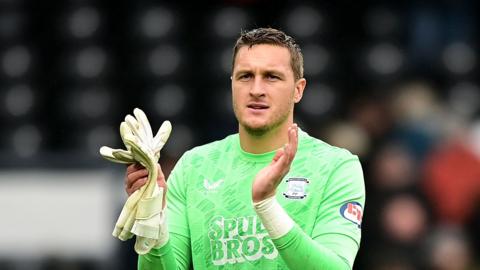 Daniel Iversen of Preston North End applauds the fans at the end of Championship match between Derby County and Preston North End at Pride Park on September 20, 2025