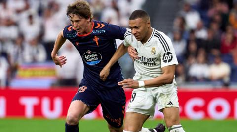 Fer Lopez playing for Celta against Real Madrid's Kylian Mbappe