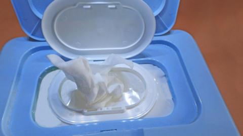 A blue packet of wet wipes. 