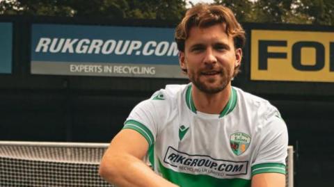 Ben Wilson pictured in the TNS shirt
