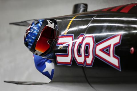 Close up of two athletes in a bobsleigh