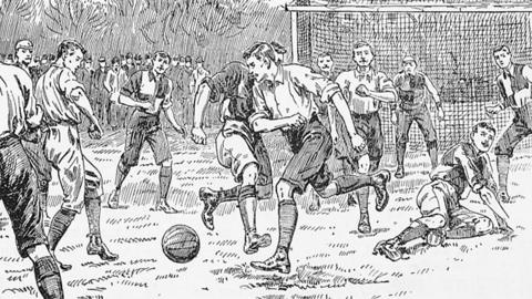 Drawing of people playing football