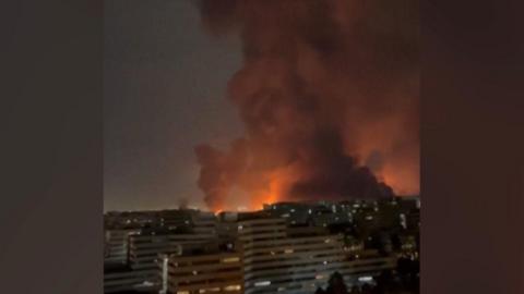 Plumes of smoke at Tehran's busiest airport