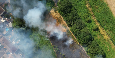 A photo shows a grassland fire in Shirehampton in Bristol