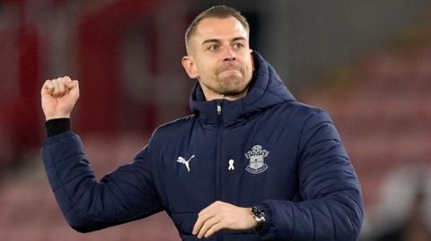 Southampton interim boss Tonda Eckert celebrates after the 3-0 win over Leicester
