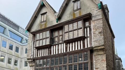 The front of Merchant's House Plymouth. It is a 16th century building made of timber and stone. 