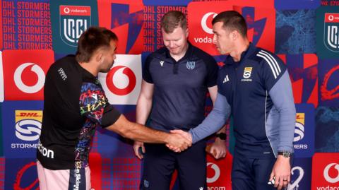 Captains shake hands
