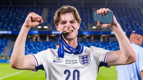 Bournemouth midfielder Alex Scott celebrates England's Under-21 European Championship triumph 