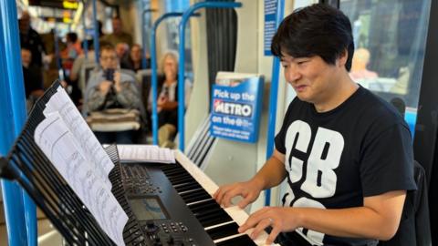 Kazuki Yamada on a tram