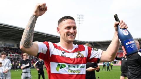 Billy Sharp celebrates promotion with Doncaster Rovers