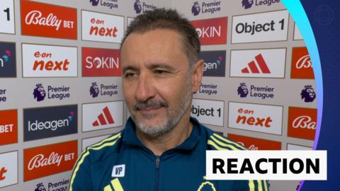 Vitor Pereira stands against advertising boards post-match 